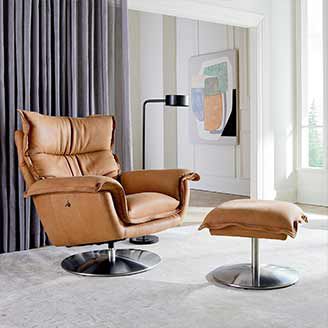 Brown leather accent chair with foot rest