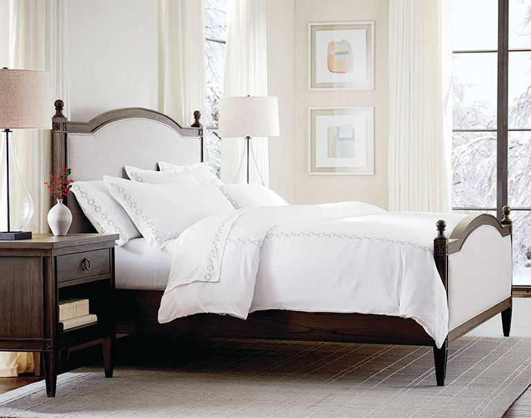Upholstered Charlotte bed in with nightstand in bedroom